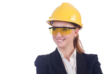Young businesswoman with hard hat on white