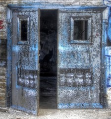 Old door with graffiti