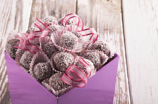 Sweet Chocolate Balls On Wood