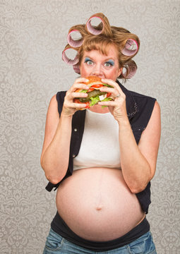 Hungry Pregant Woman Eating