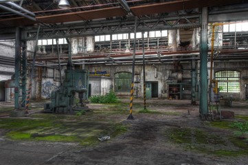 Old machine in an abandoned hall