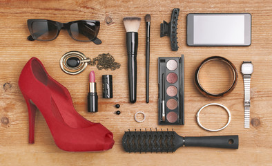 Overhead of essentials fashion woman objects.