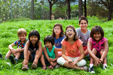 Fototapeta na wymiar Diversity portrait of kids outdoors.