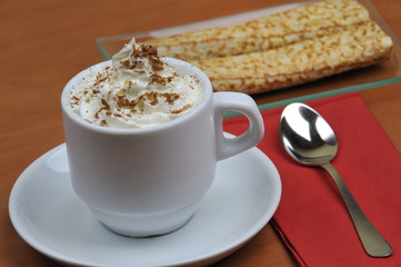 Viennese coffee with crepes or pancakes