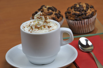 Viennese coffee with cinnamon and chocolate muffins