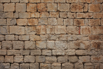 Old gray wall of the stones