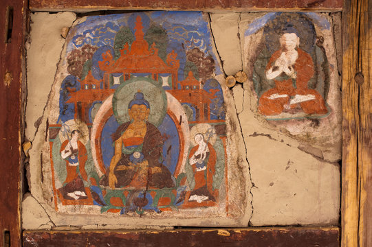 Old mural at Buddhist monastery wall. India