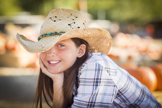 Smiling Girl Portrait at the Pumpkin Patch