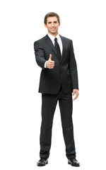 Full-length portrait of business man who thumbs up