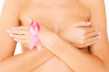 naked woman with breast cancer awareness ribbon