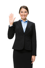 Half-length portrait of businesswoman waving hand