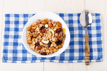 Healthy muesli breakfast with nuts and raisin