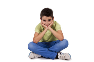 boy sitting isolated on white background