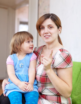 Mother berates her child in interior