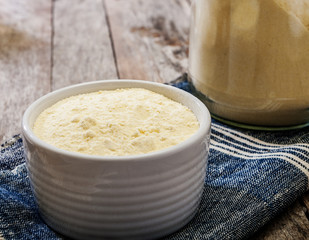 corn flour on wooden background