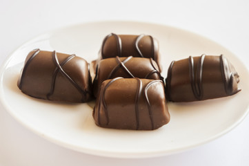 Tasty chocolate bonbon isolated on a white background
