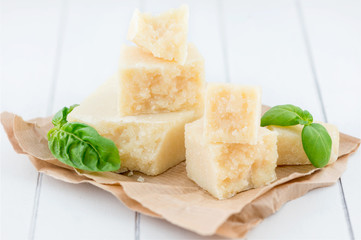 Parmesan cheese and basil leaves
