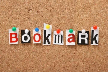 The word Bookmark on a cork notice board