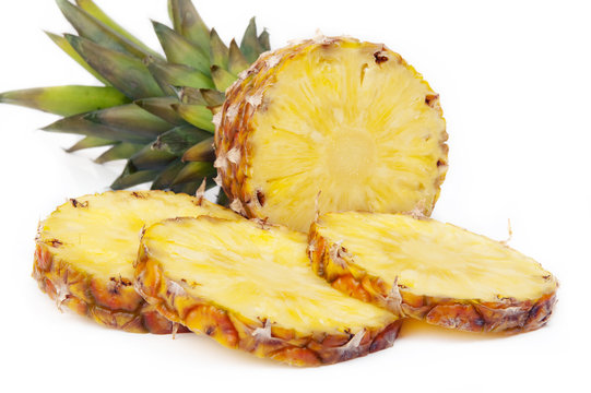 Fresh sliced pineapple on white background