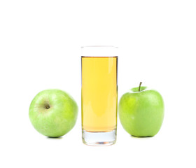 Green apples and juice in the glass