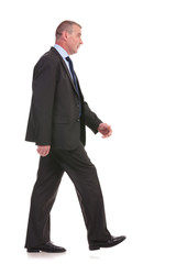 business man walking - side picture