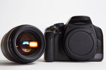 Modern digital photo camera with 85 mm lens