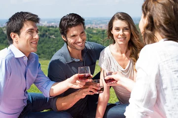 Fotobehang Group Of Friends Enjoying Wine © Rido