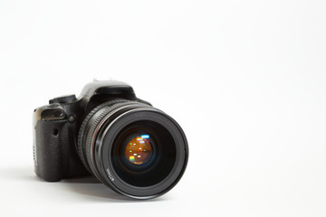 Fototapeta premium Modern digital photo camera with 24-70mm lens