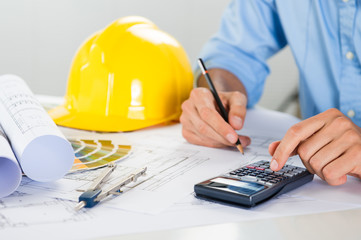 Architect Working At Desk
