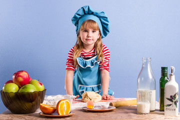 little chef works with the dough