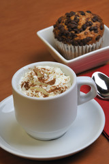 Viennese coffee with cinnamon and chocolate muffins