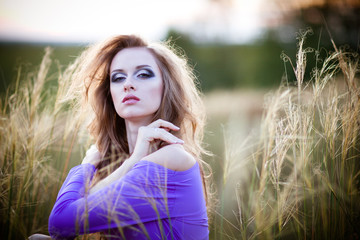 Young woman outdoors fashion portrait.