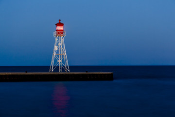 Fototapeta na wymiar Lighthouse Beacon on Lake