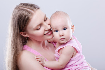 picture of happy mother with baby .