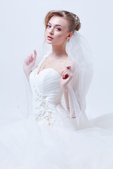 Fototapeta na wymiar Bride portrait.Wedding dress. Studio shot.