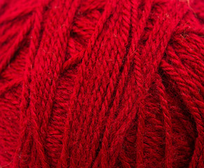 Red woolen thread closeup