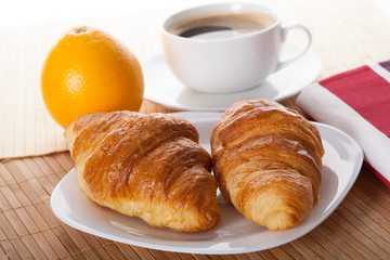 Coffee break with croissant