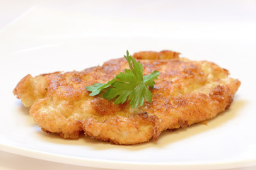 Schnitzel on white plate