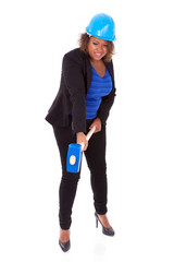 African American woman holding a demolition hammer  - Black peop