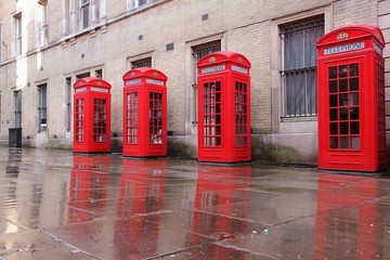 London, UK - red telephone booths at Broad Court