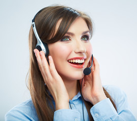 Smiling woman call center operator touching headsed. Close up b