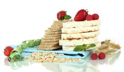 Tasty crispbread with berries, isolated on white