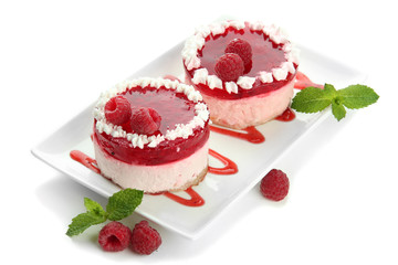 Delicious berry cakes isolated on white