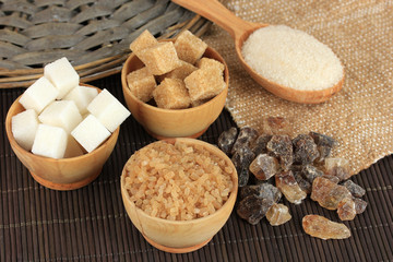 Different types of sugar on table close-up