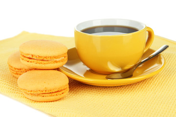 Coffee and macaroons isolated on white