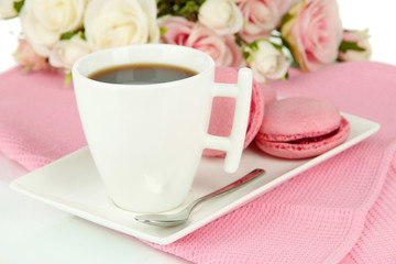Coffee and macaroons close-up