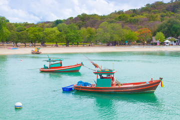 Fototapeta premium Small fishing boats moored in the sea.