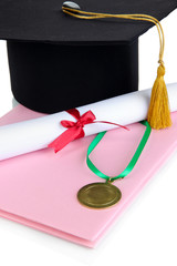 Medal for achievement in education with diploma, hat and