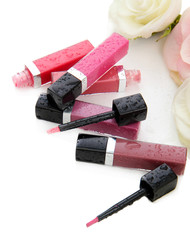 Beautiful lip glosses, isolated on white