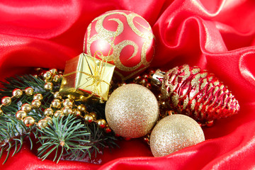 Beautiful Christmas decor on red satin cloth
